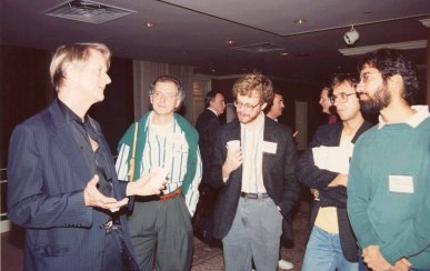 Ted Nelson holds forth in discussion with Norbert Streitz and others at the Hypertext 1989 Conference in Pittsburgh, PA.