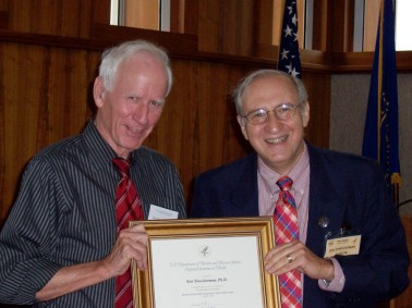 Clem MacDonald of NIH gives Ben Shneiderman a certificate for his participation in the National Library of Medicine's Board of Scientific Counselors, in Bethesda, MD in September 2010.